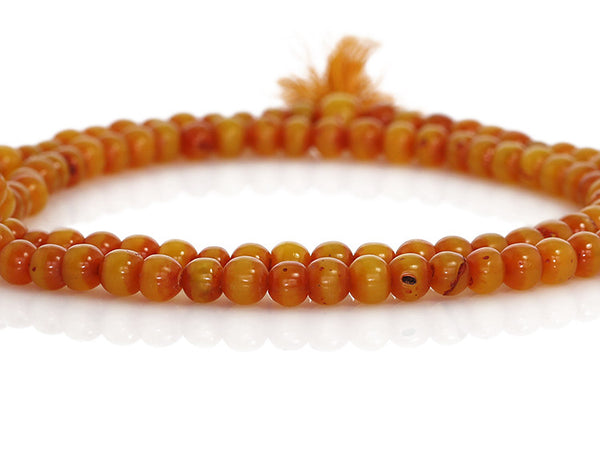 Amber Buddhist Mala Beads Close Up