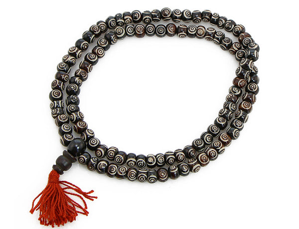 Buddhist Mala Beads with Carved Chakra Symbols Top View