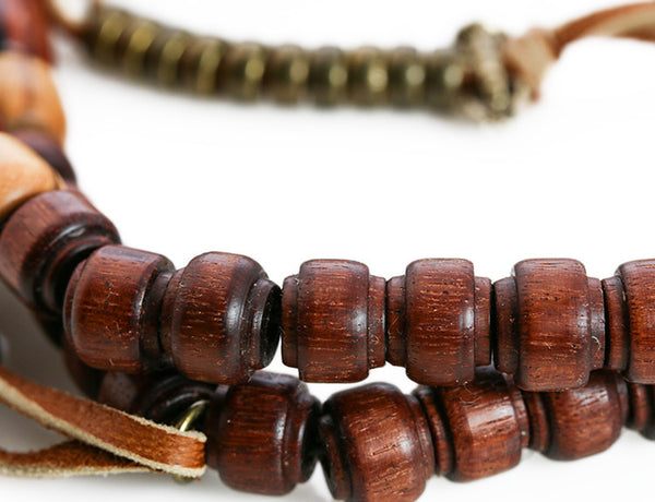 Buddhist Mala Beads with Rengas Tiger and Quina Wood Close Up