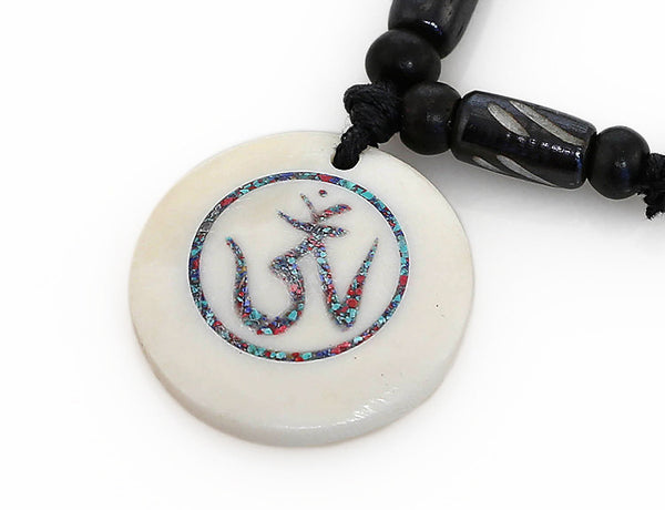 Tibetan Buddhist Necklace Gemstone Inlaid Om Symbol Pendant Close Up