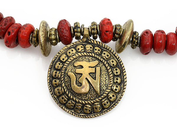 Tibetan Necklace with Coral And Om Pendant Close Up