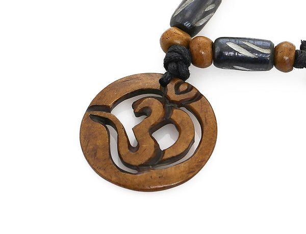 Yoga Necklace Cut Out Brown Om Symbol Pendant Close Up